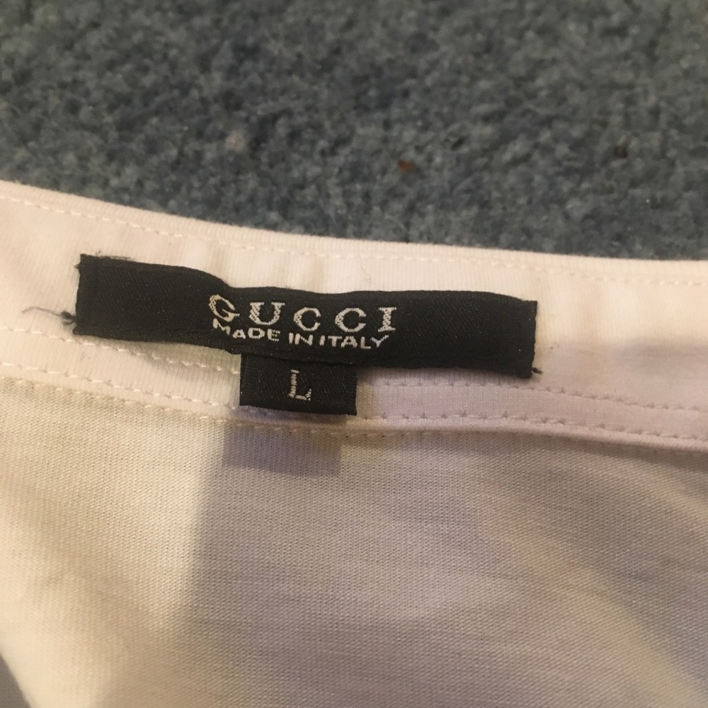 Gucci polo size L but fits like a M